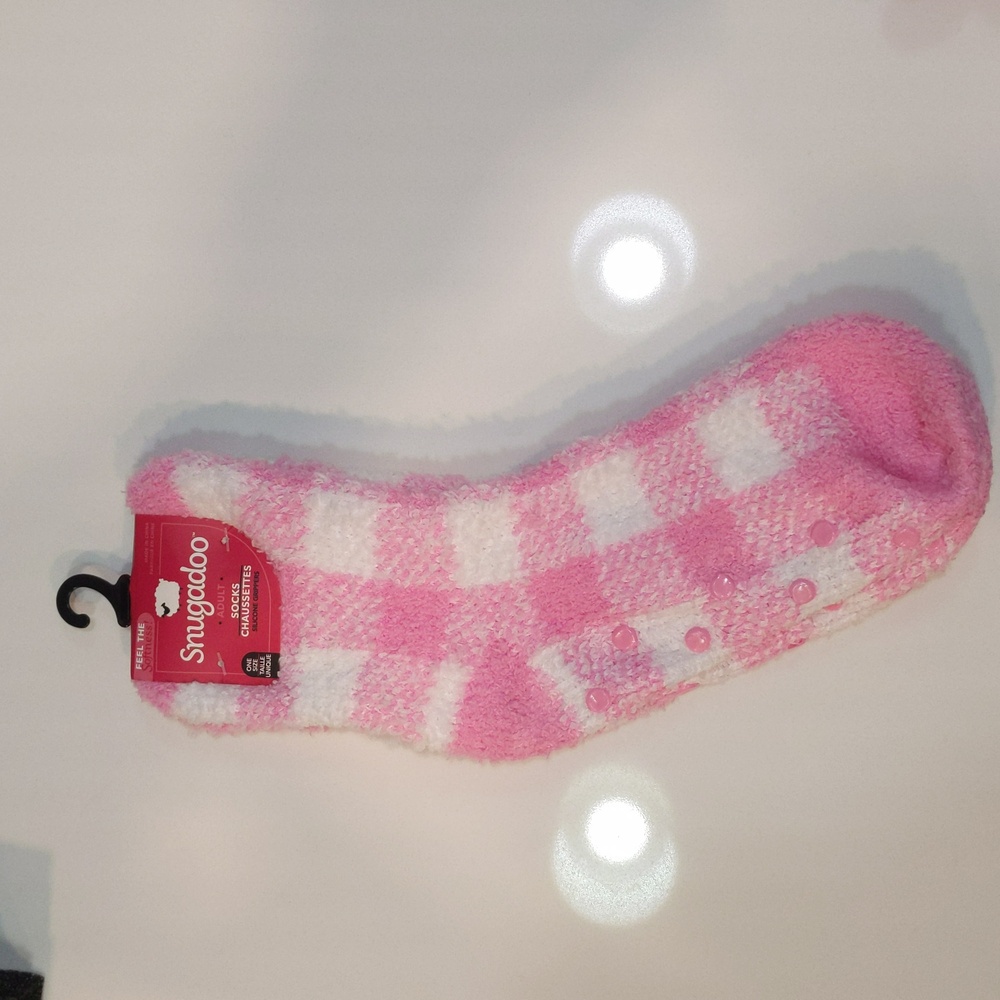 Pink Snugadoo fuzzy socks with grips